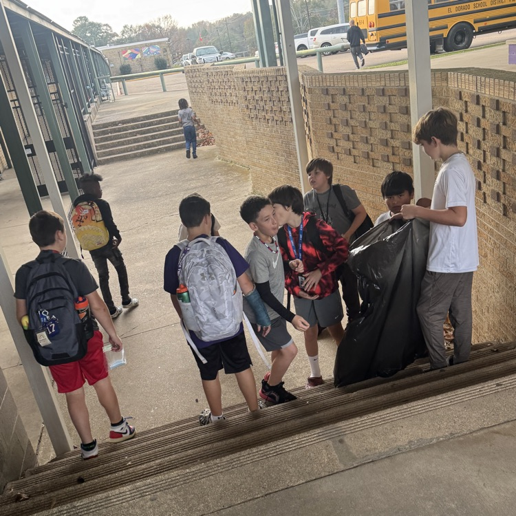 students picking up trash