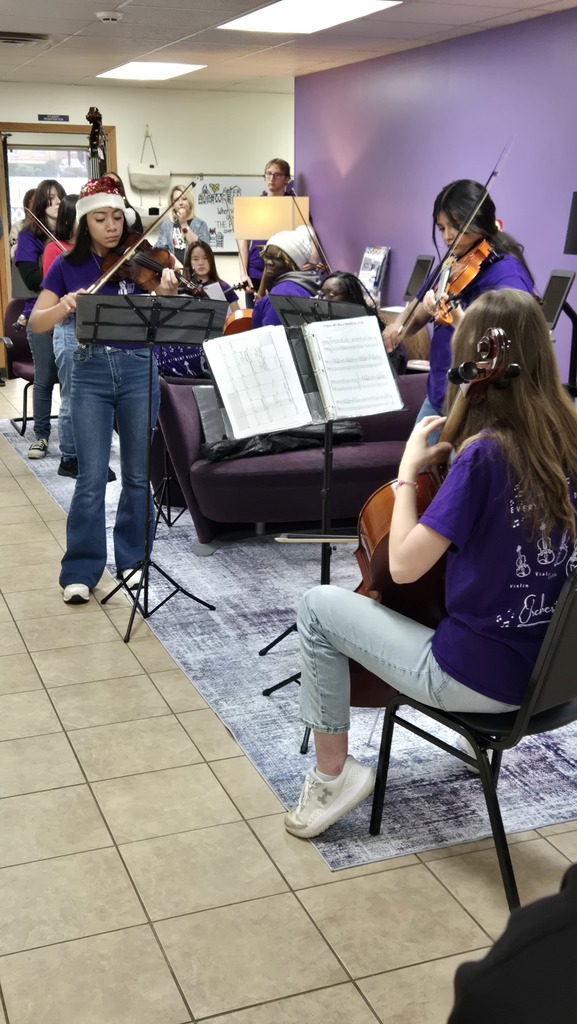 orchestra trio playing christmas music