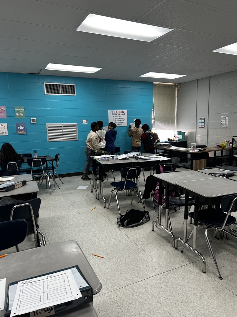 Students multiplying fractions