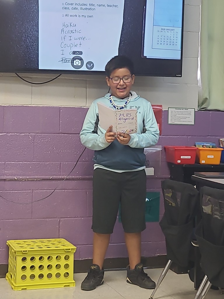 student sharing poetry