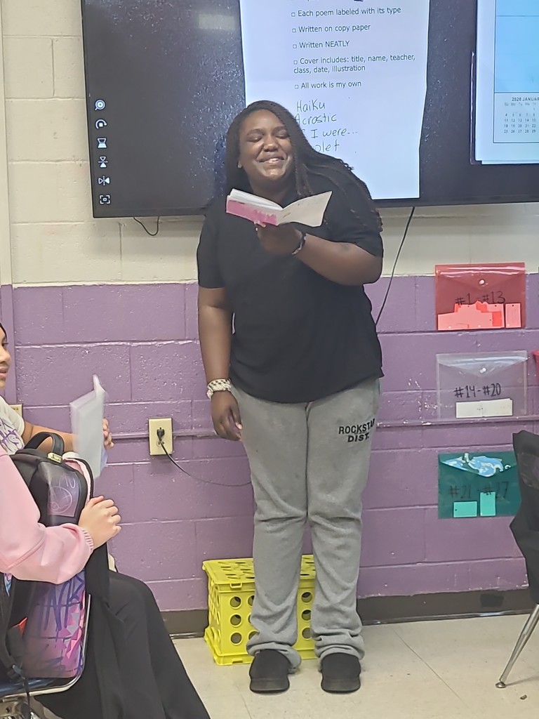 student sharing poetry