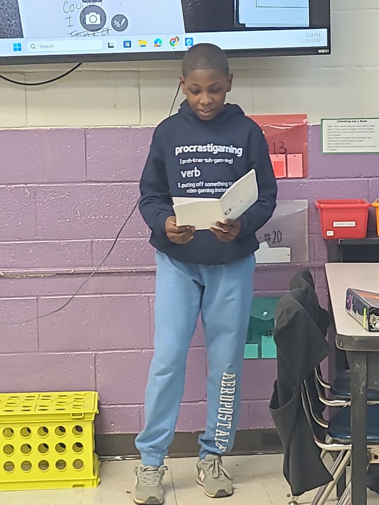 student sharing poetry