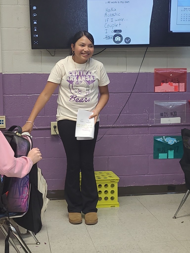 student sharing poetry