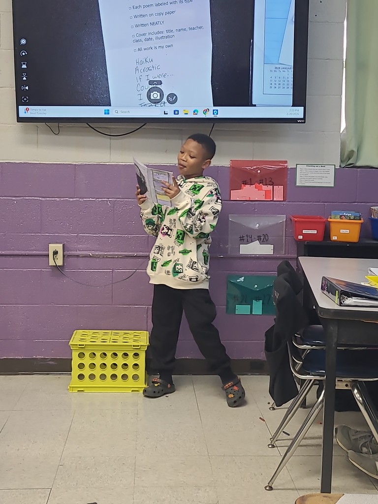 student sharing poetry