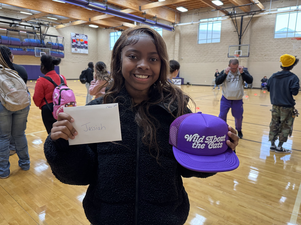 EHS STUDENT HOLDING WILDCAT HAT AND GIFT CARD