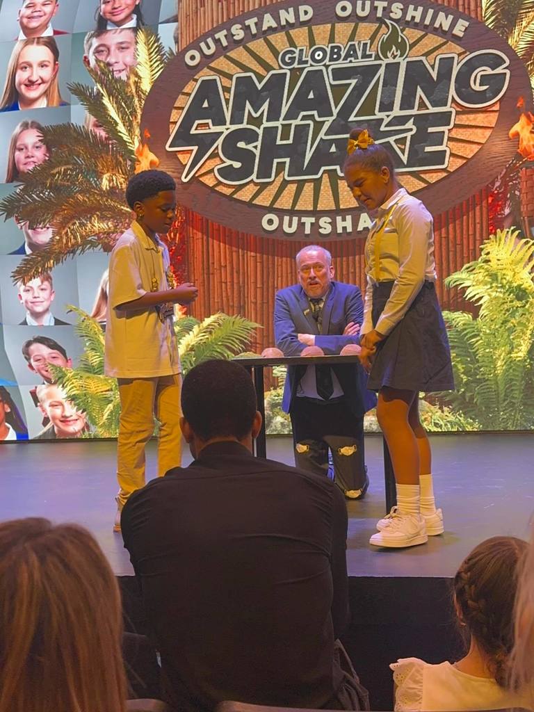 students from competition shake class pictured with teacher and principals at ron clark academy in atlanta ga!