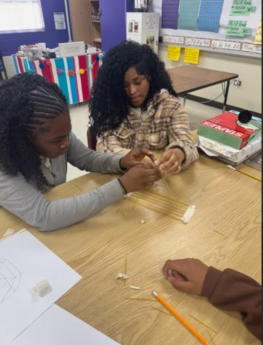 Girls Beginning to Build Bridge