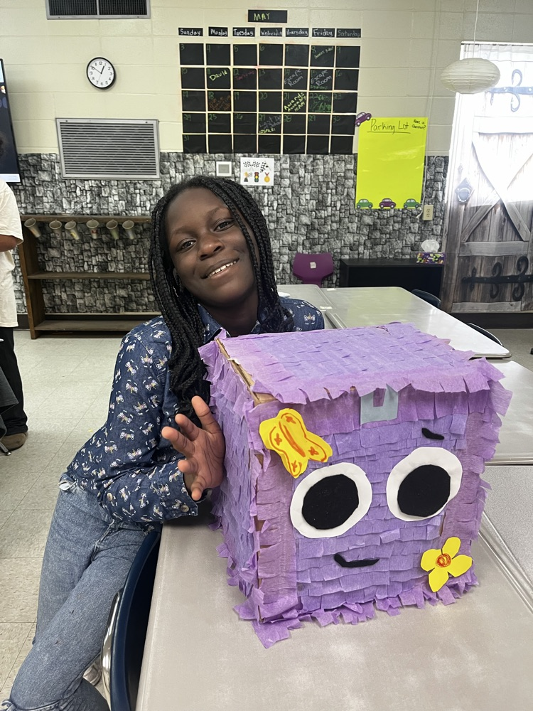 student and piñata  