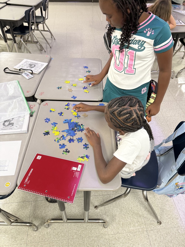 Students assembling puzzle