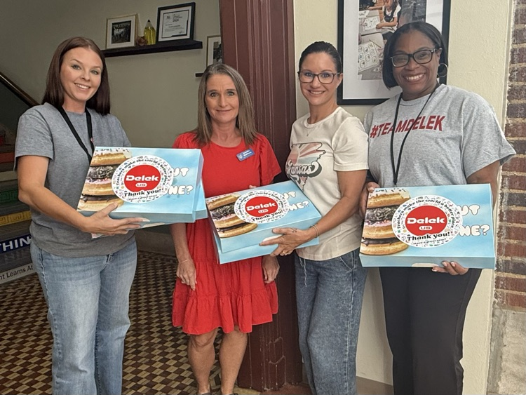 staff with donut boxes 
