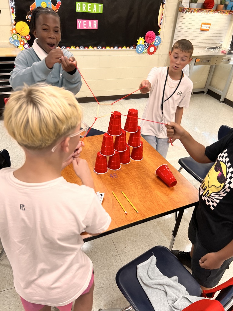 Students participating in cup challenge