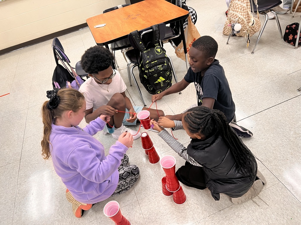 Students participating in cup challenge