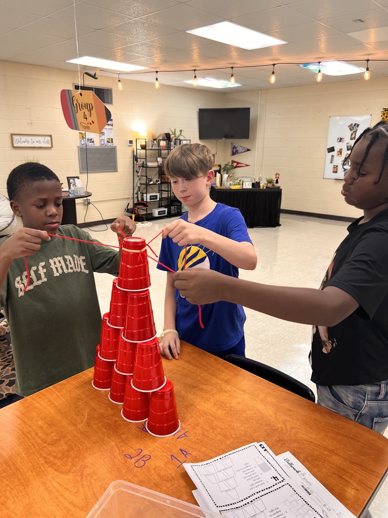 Students participating in cup challenge