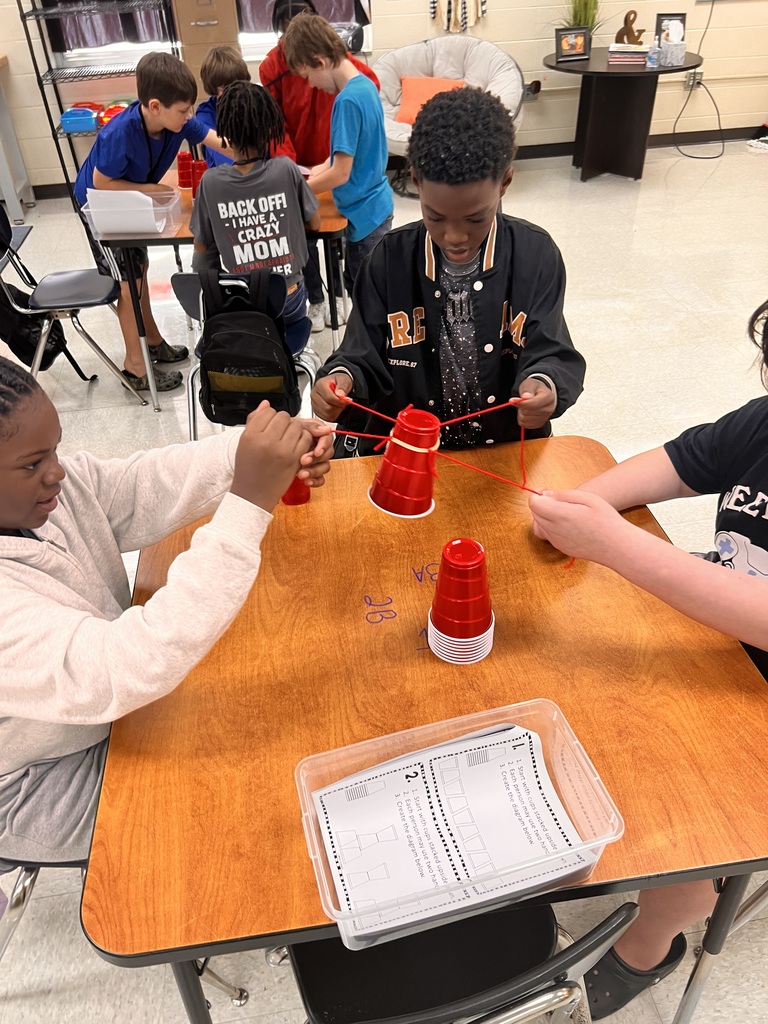 Students participating in cup challenge