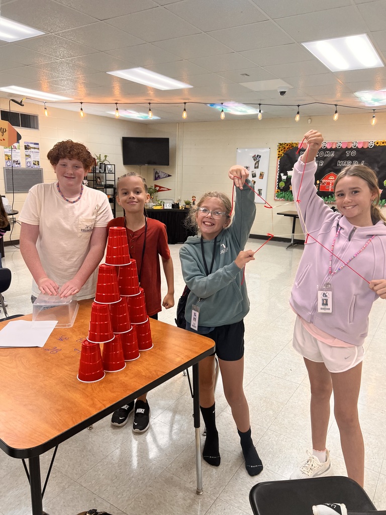 Students participating in cup challenge