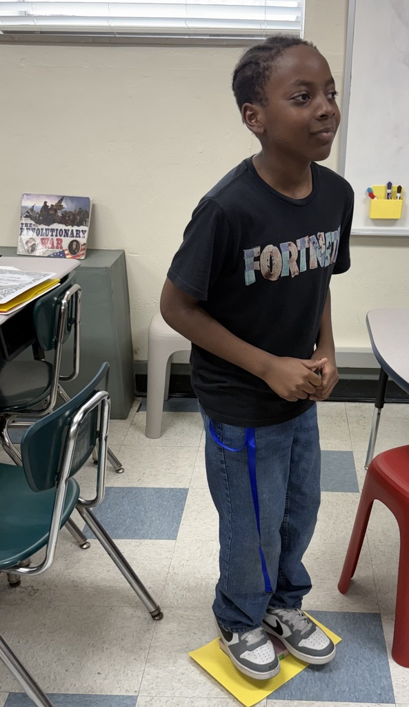 student standing on foam to make a print