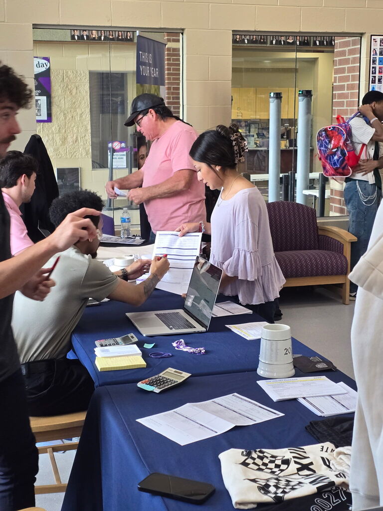 Seniors ordering their cap and gown