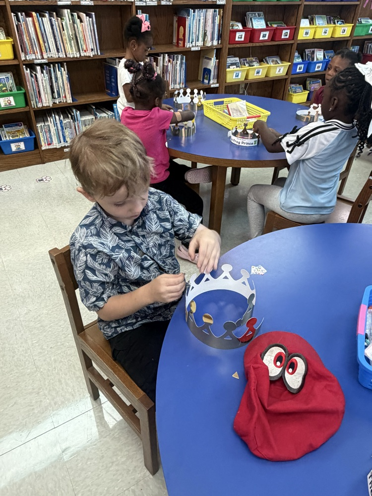 a child making a paper crown