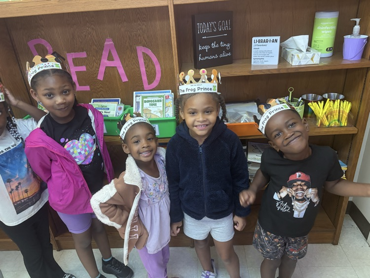students lined up with their paper crowns on