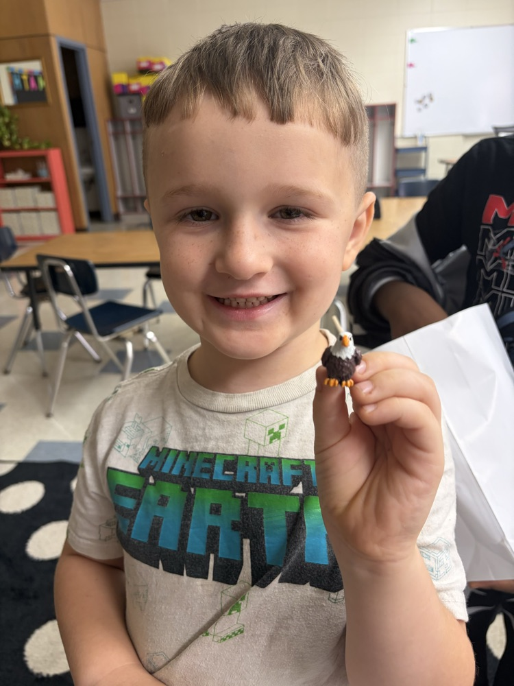 student carrying his Eagle