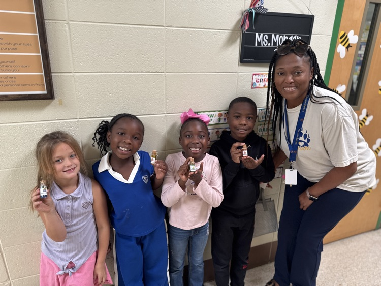 students holding potion bottles