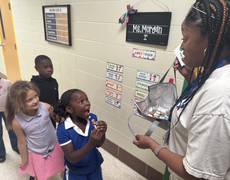 student receiving potion bottle