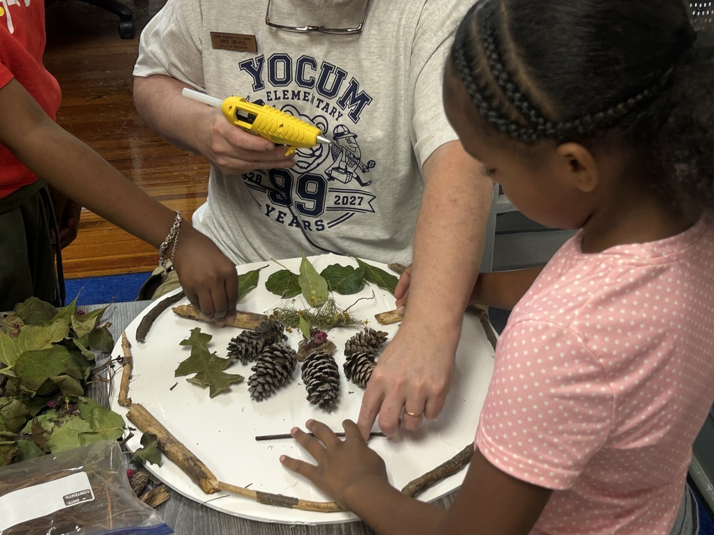 adding bits of nature to a round cardboard