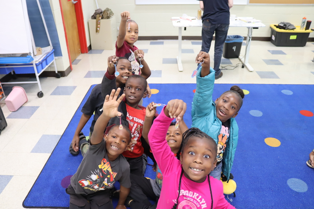 group of students showing off their keychains