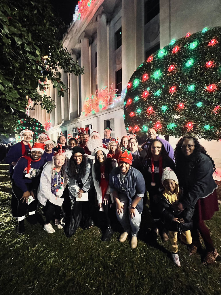 Staff singing at Holiday Lighting Ceremony!