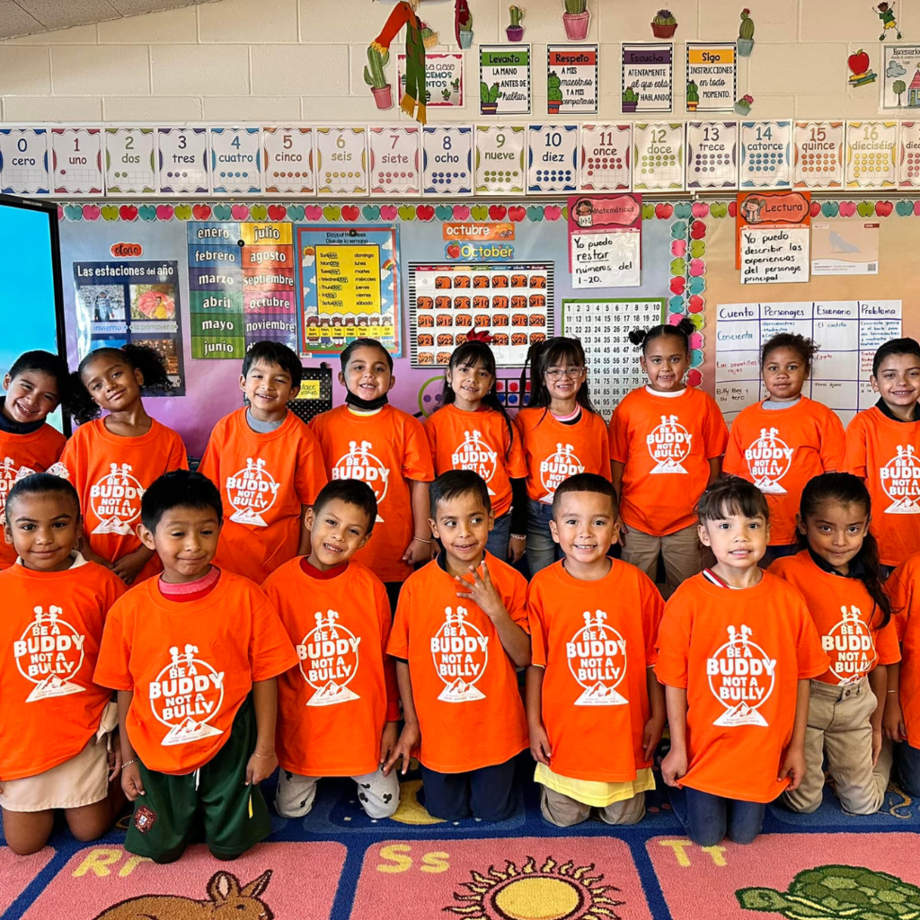 Sunrise Mountain Elementary students taking photo in Be a Buddy Not a Bully t-shirts