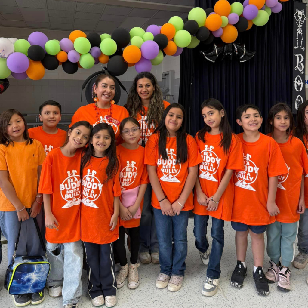 Green Elementary students taking photo in Be a Buddy Not a Bully t-shirts