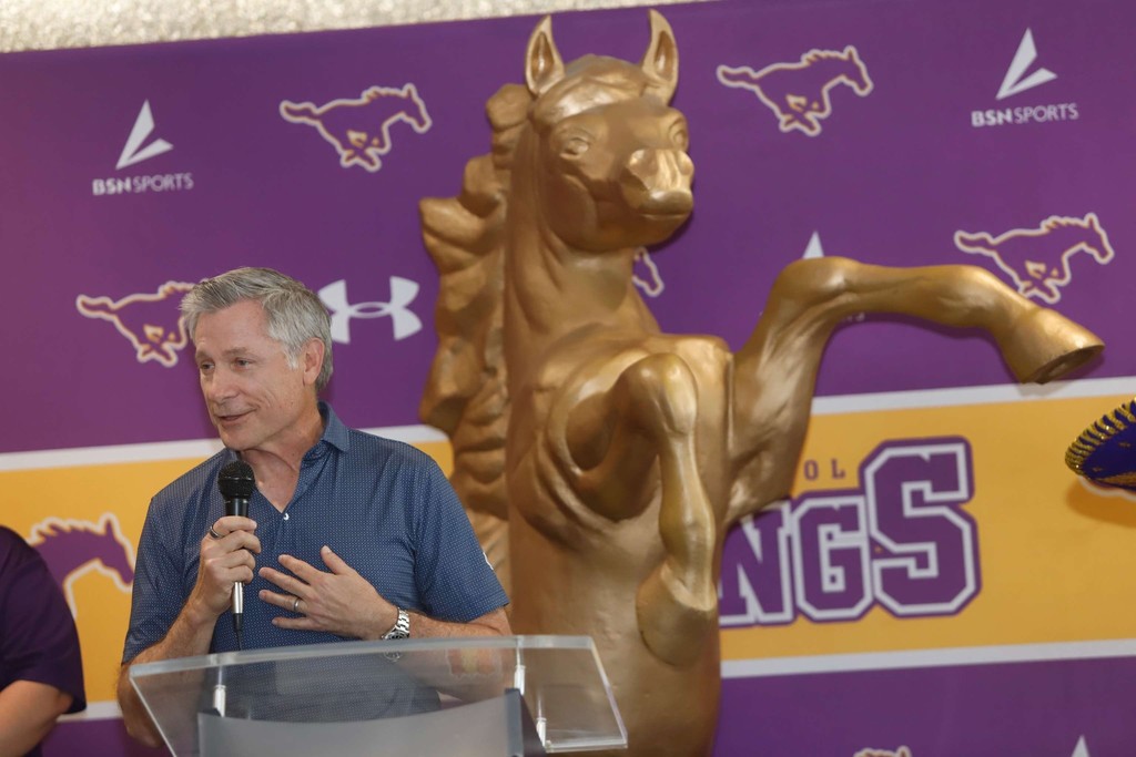 Bill Macatee speaks to Burges High School students and staff