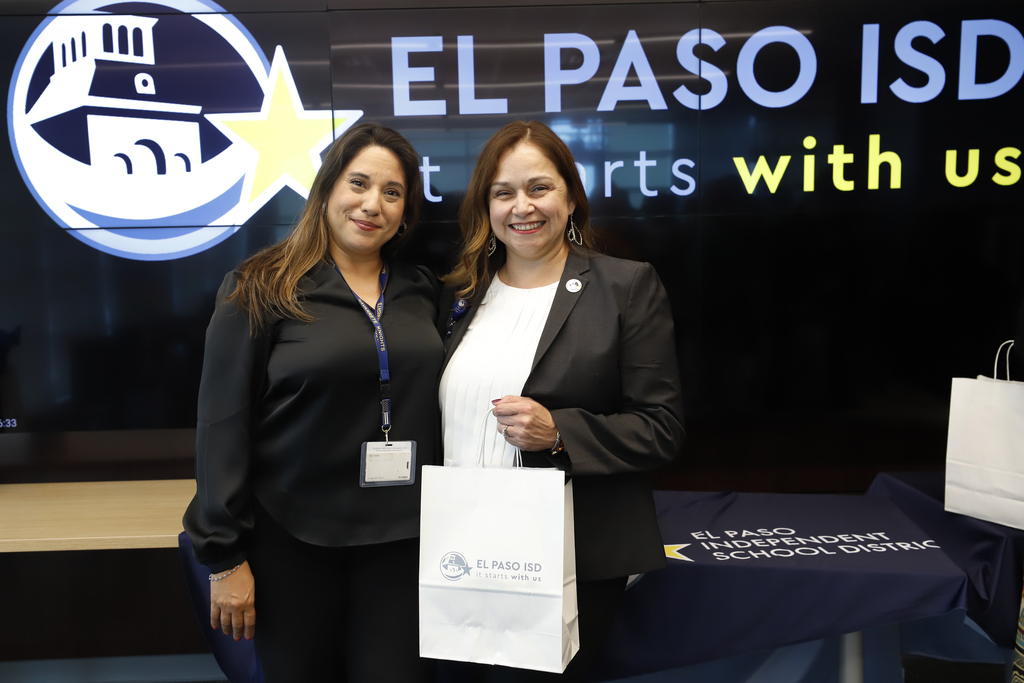 El Paso ISD staff members smile for a photo