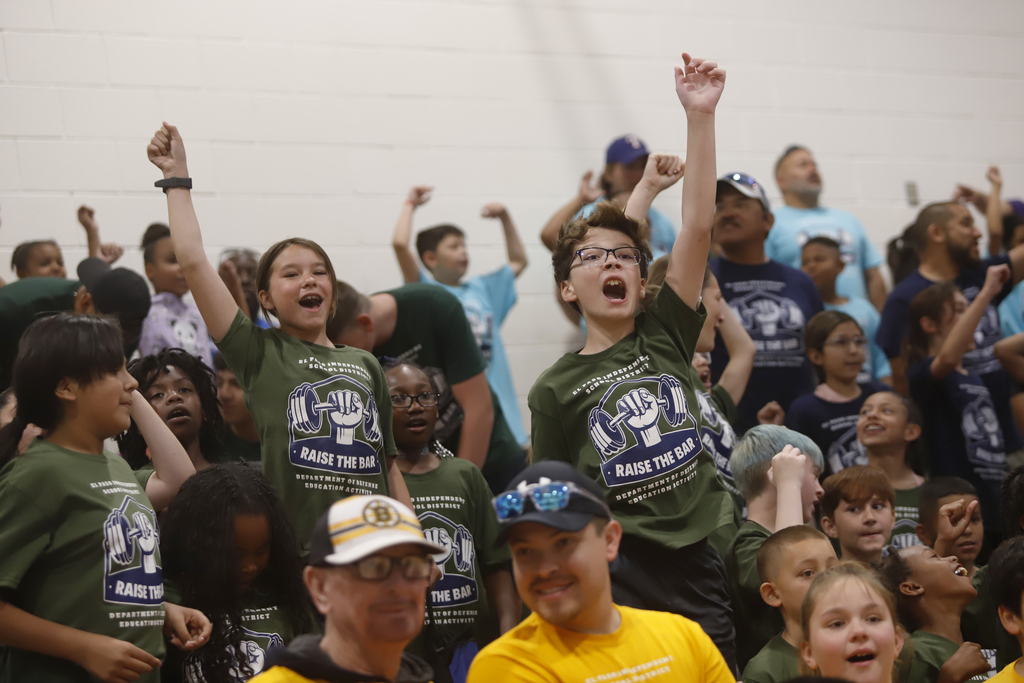 Students cheering during a pep rally