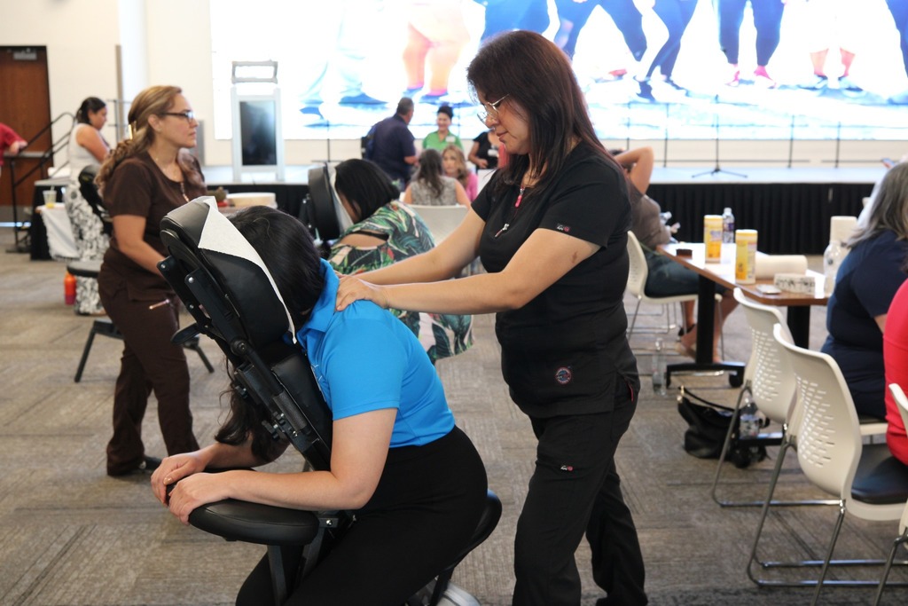 Employee receiving a free back massage