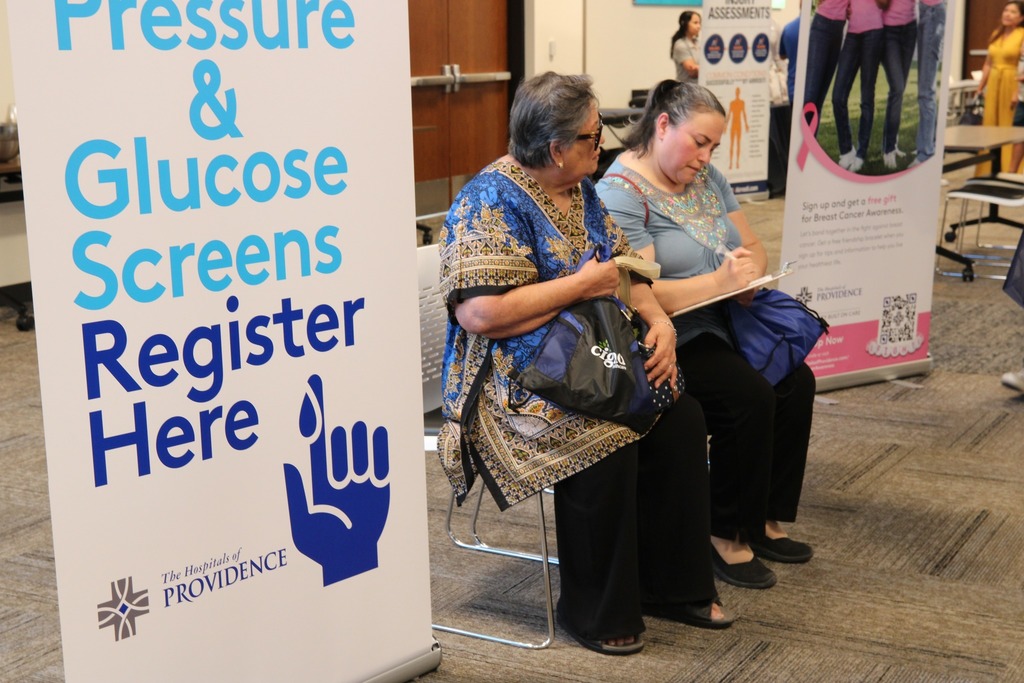 El Paso ISD fill out paperwork to receive blood pressure and glucose screenings
