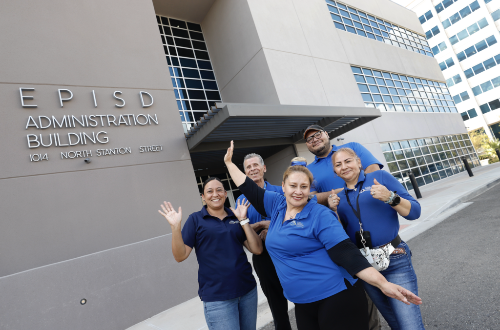 District custodians pose in front of EPISD administration building