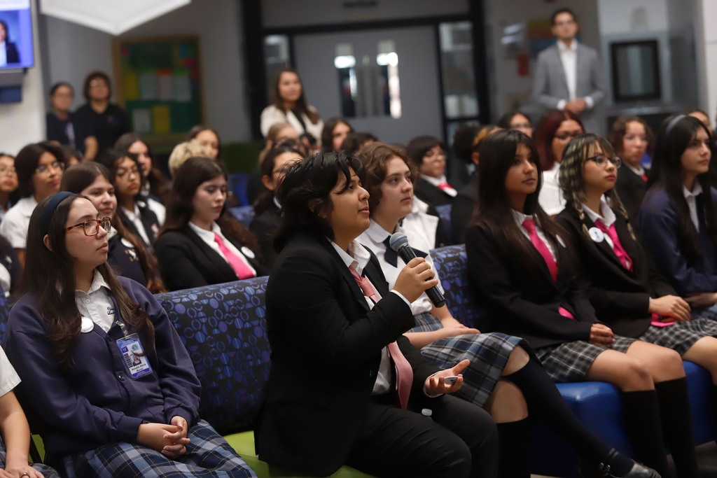 Young Women's STEAM Prep Academy asking a question