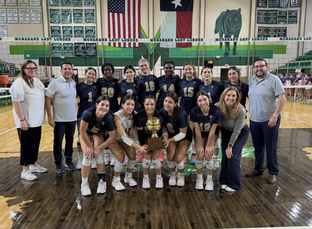 Coronado High School volleyball team takes group photo with bi-district trophy