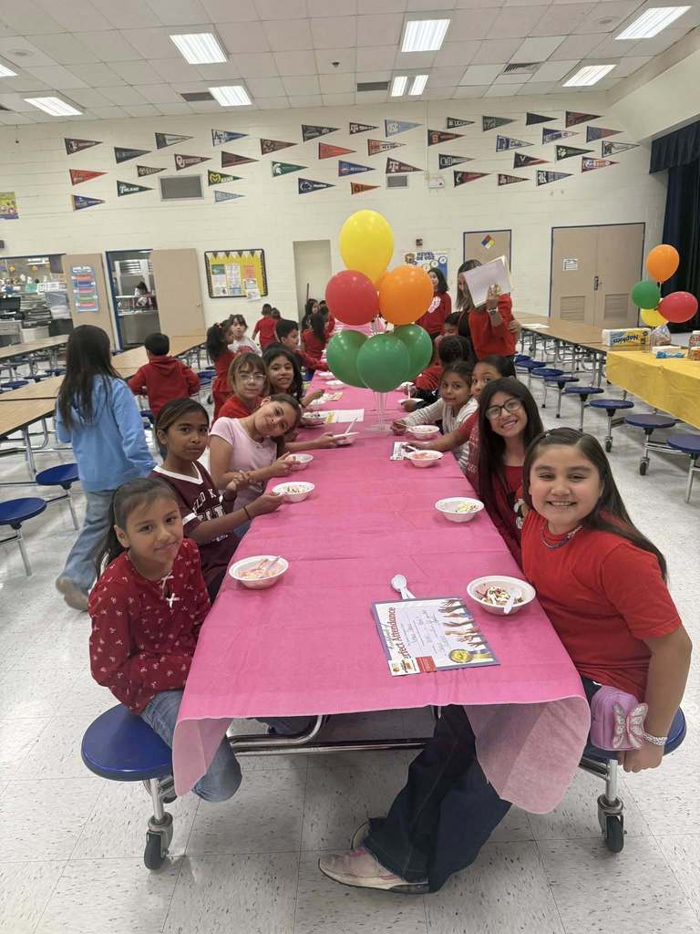 Sunrise Mountain Elementary School smile for a group photo with their ice cream