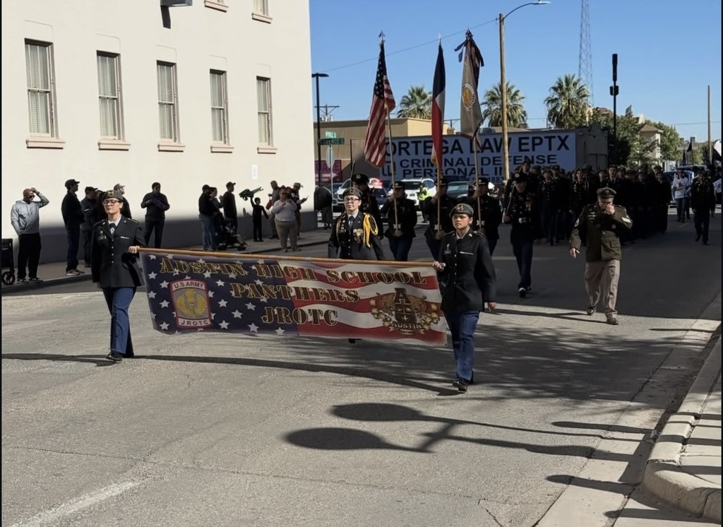 Austin JROTC students and instructors marching at 2025 El Paso Veterans Day Parade