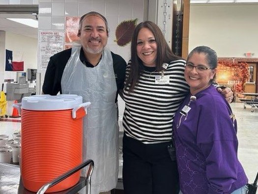Transportation Department helping serve the Thanksgiving luncheon at Milam Elementary School