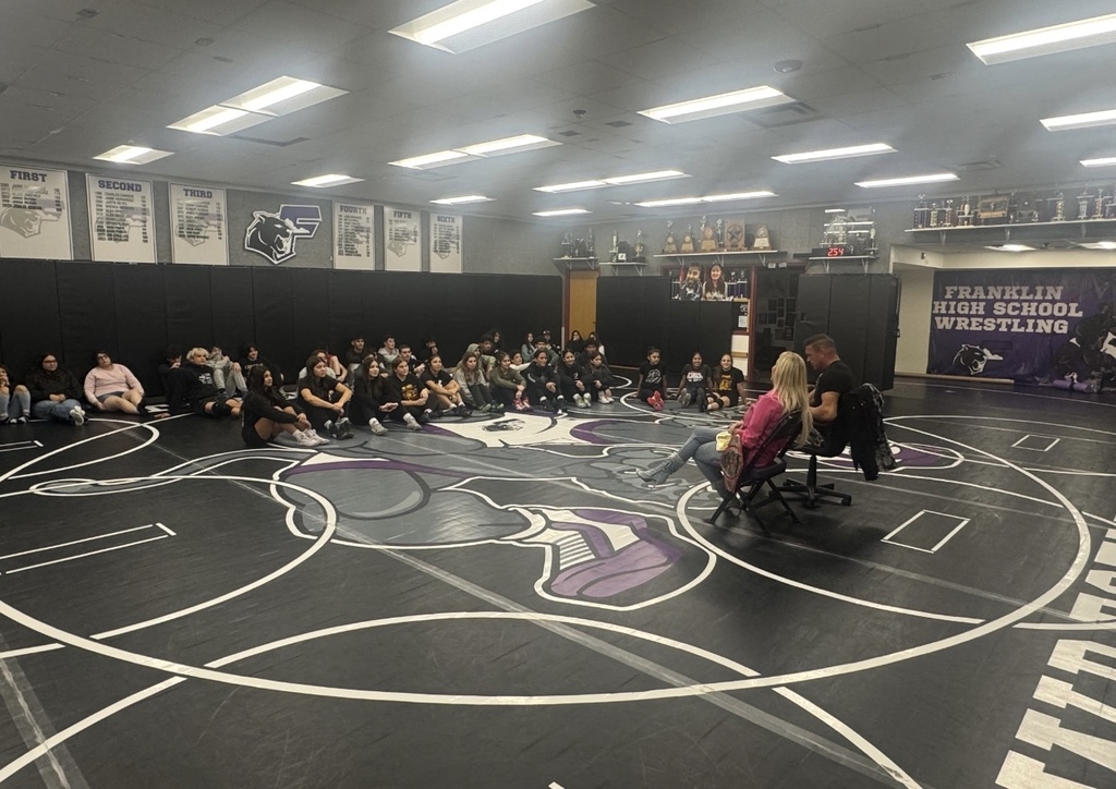 Franklin High School Wrestling listening to TNA stars Ashley Diaz de Villegas and Frankie Kazarian advice