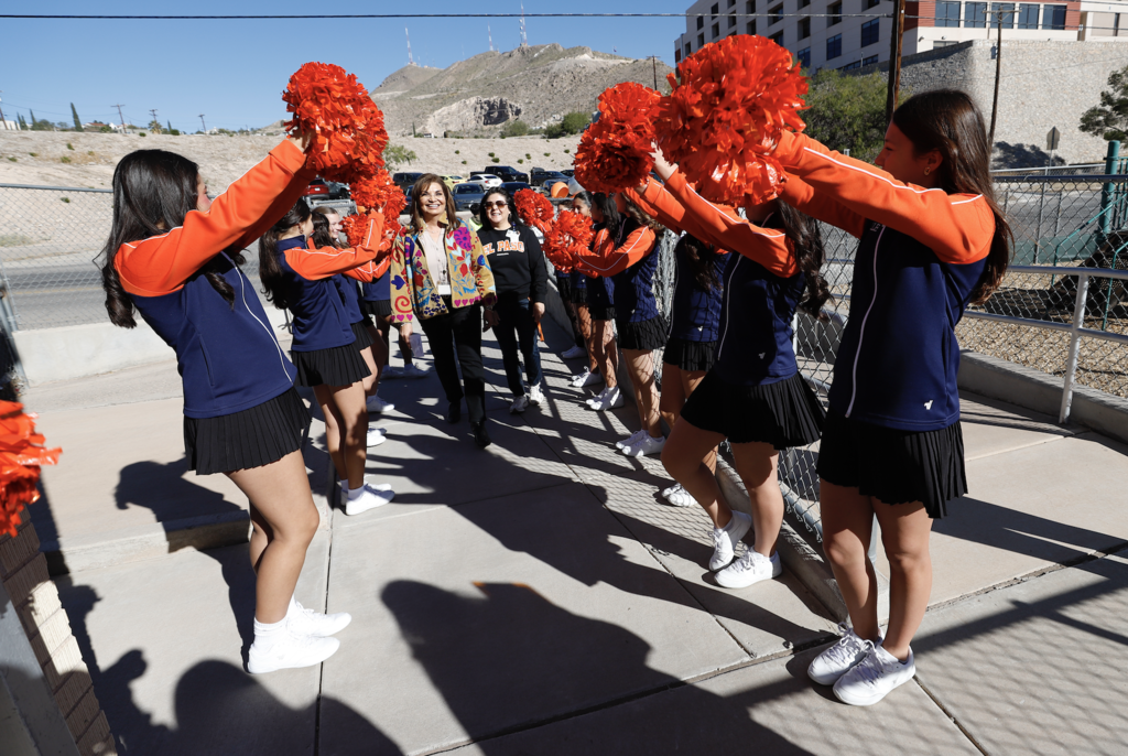 Wiggs Middle School Cheerleaders cheer on Interim Superintendent Martha Aguirre and El Paso High School principal Dr. Sandra Rocha as they enter the Lamar Family Resource Center