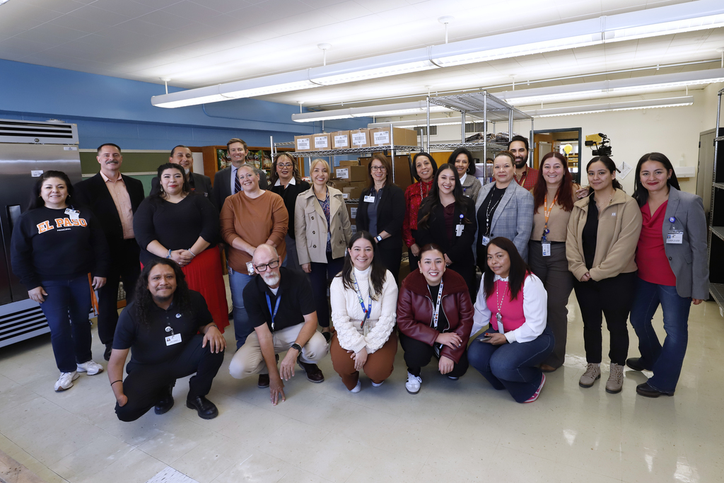 El Paso ISD Interim Superintendent Martha Aguirre, El Paso High feeder pattern principals, and three El Paso ISD board members, and El Paso ISD staff members take group photo in the Lamar Family Resource Center