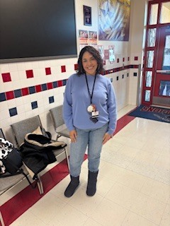 TEACHER WEARING BLUE