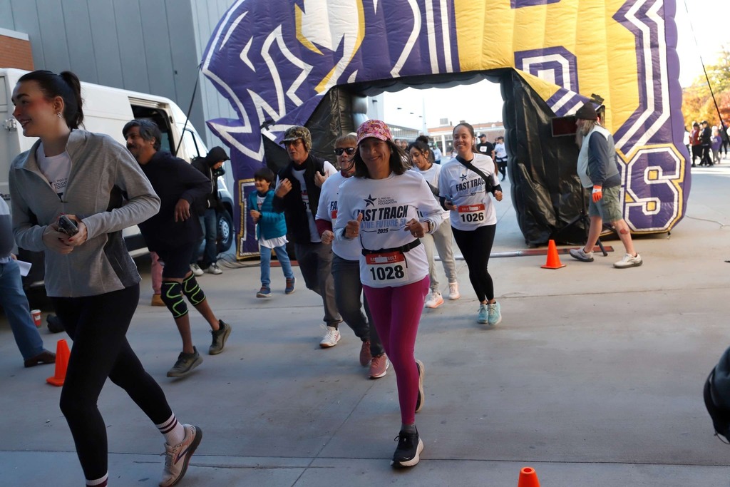 Community members taking off during the Fast Track to the Future 5K