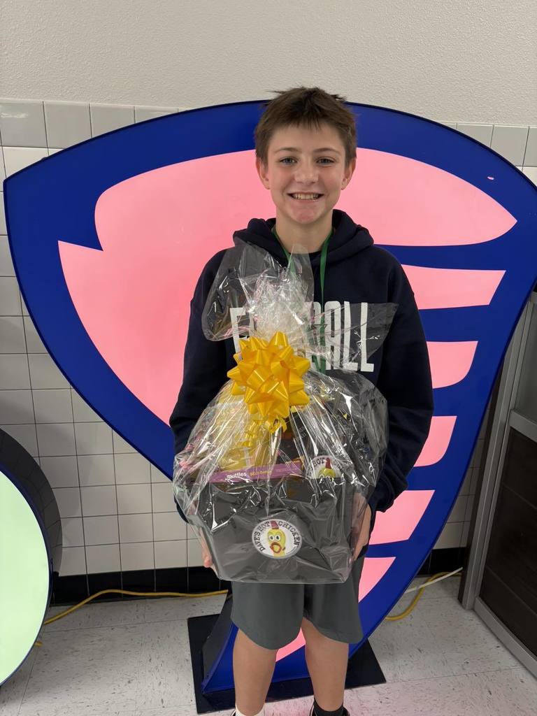 Hornedo student with their perfect attendance goodie basket