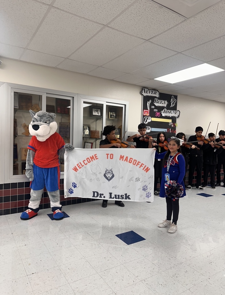 Magoffin Middle School students welcome El Paso ISD Superintendent Dr. Brian Lusk to their campus with sign and orchestra