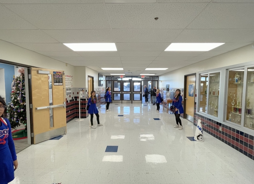 Magoffin Middle School cheerleaders waiting to surprise El Paso ISD Superintendent Dr. Brian Lusk
